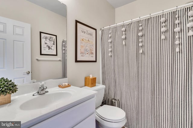 216 Pelagic Ln, Solomons, MD 20688 - full bath with vanity, toilet, and a shower with shower curtain