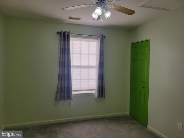 unfurnished room featuring carpet flooring and ceiling fan