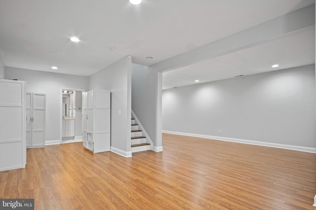 basement featuring light hardwood / wood-style flooring