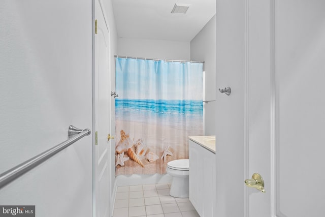 bathroom featuring tile patterned flooring, vanity, a shower with shower curtain, and toilet