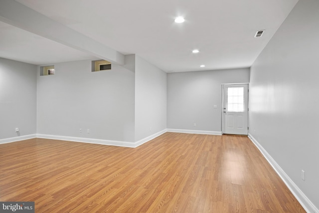 unfurnished room featuring light hardwood / wood-style flooring