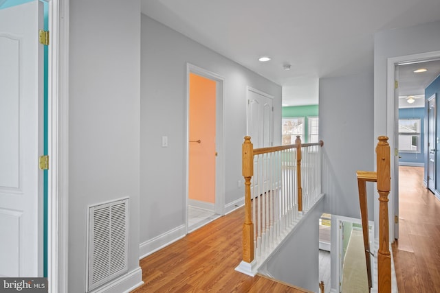 hall featuring light hardwood / wood-style floors