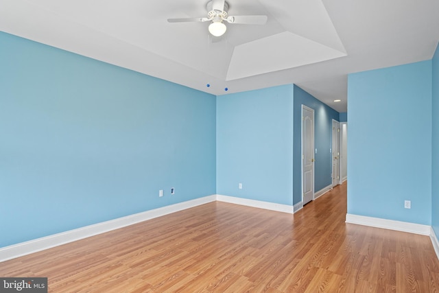 spare room with ceiling fan and light hardwood / wood-style flooring