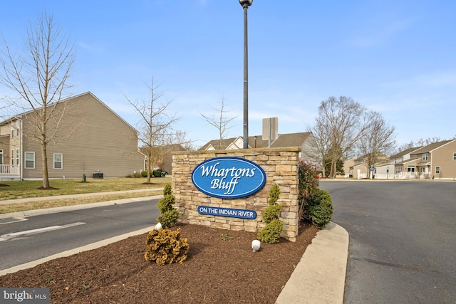 view of community sign