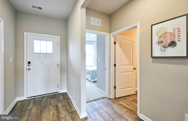 entrance foyer featuring hardwood / wood-style flooring