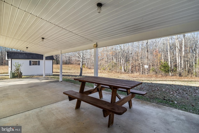 view of patio / terrace with an outbuilding