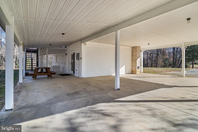 view of patio / terrace featuring a carport