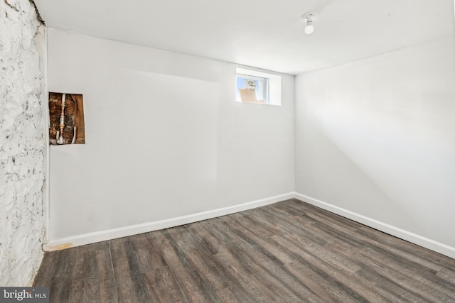 basement featuring hardwood / wood-style floors