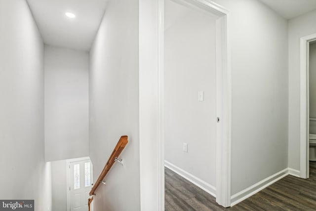 hallway featuring dark wood-type flooring