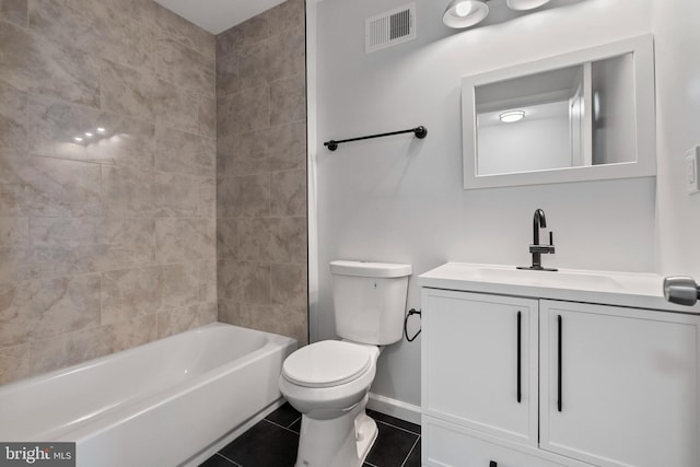 full bathroom featuring tile patterned flooring, vanity, tiled shower / bath combo, and toilet