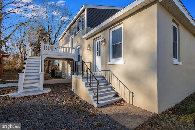 exterior space featuring central AC unit