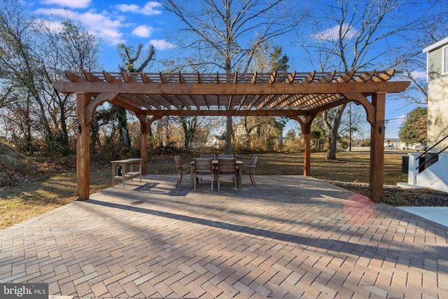 view of property's community with a patio area and a pergola