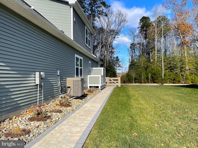 view of yard featuring central AC unit