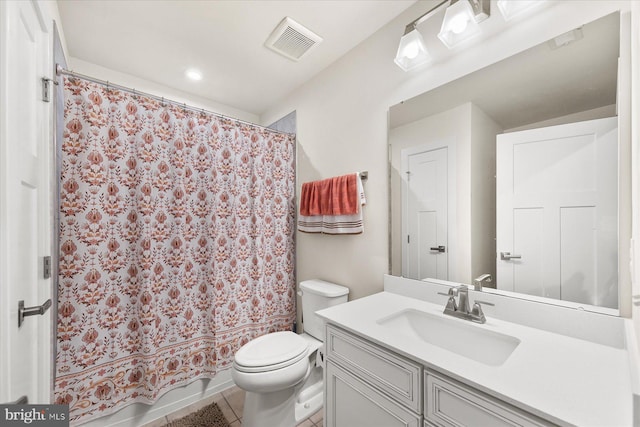 full bathroom with tile patterned flooring, vanity, shower / bath combination with curtain, and toilet