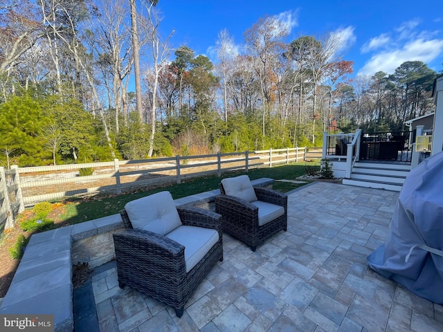 view of patio with a wooden deck