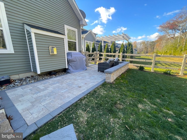 view of yard with a pergola and a patio