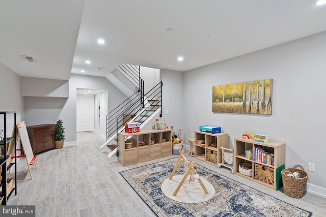 rec room featuring light hardwood / wood-style floors