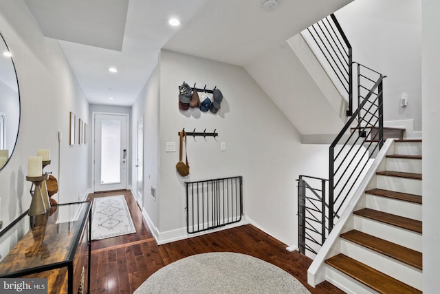 entryway with dark wood-type flooring