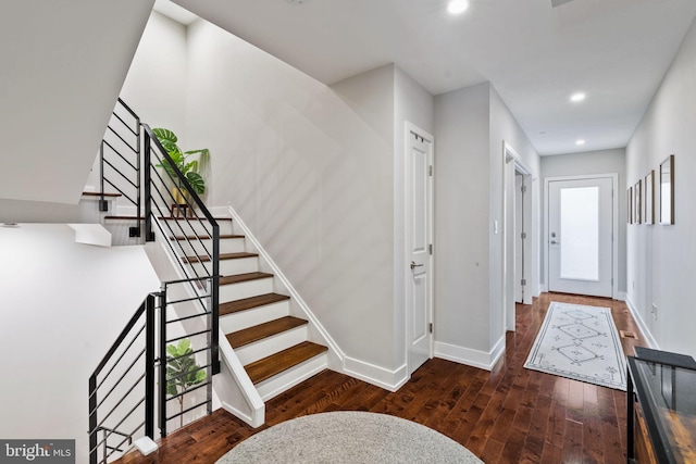 foyer featuring dark wood-type flooring