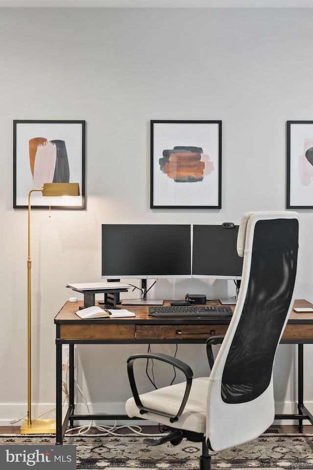 home office featuring hardwood / wood-style flooring