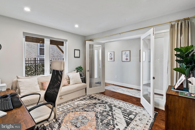 interior space with dark hardwood / wood-style flooring and french doors