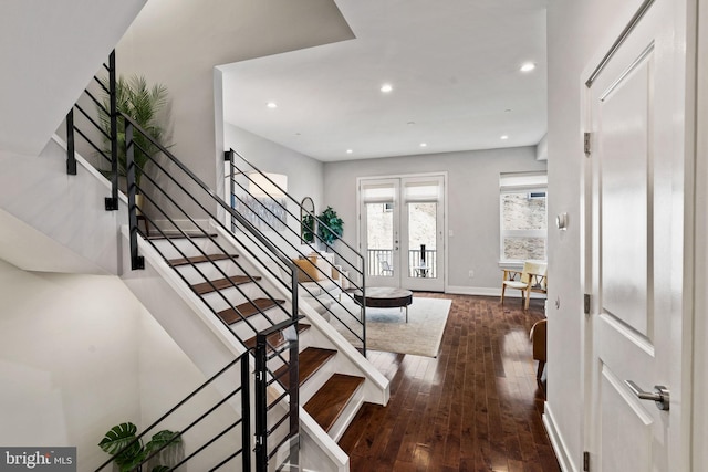 entrance foyer with dark hardwood / wood-style flooring