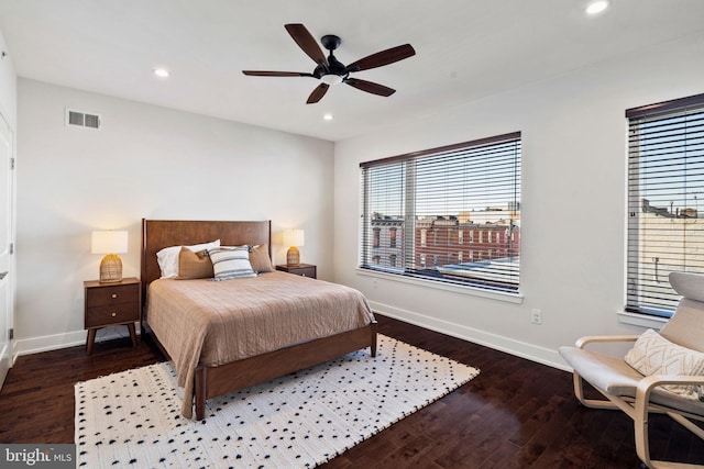 bedroom with hardwood / wood-style flooring and ceiling fan