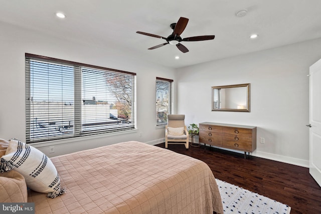 bedroom featuring hardwood / wood-style flooring and ceiling fan