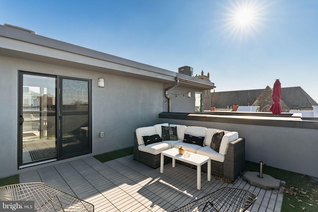 deck featuring an outdoor living space