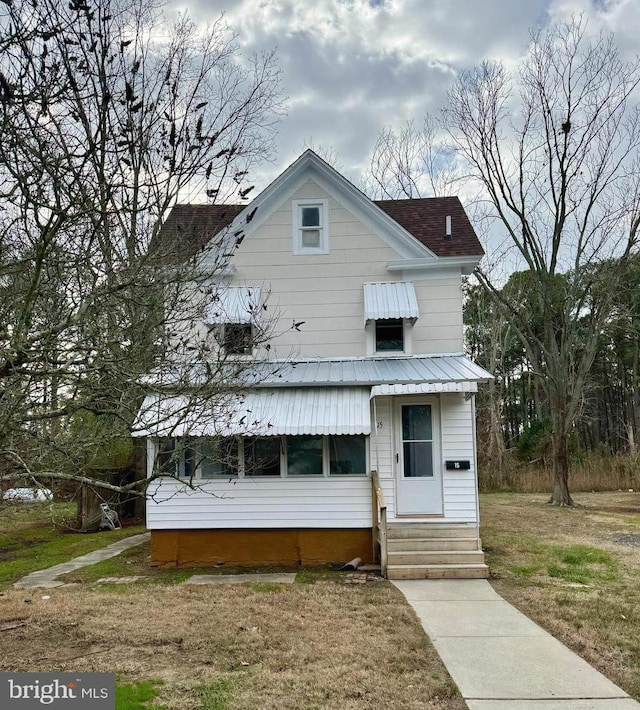 view of front of house featuring a front yard