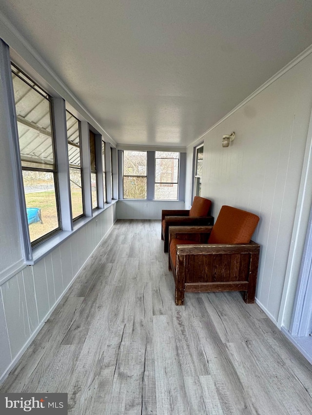 unfurnished sunroom featuring plenty of natural light