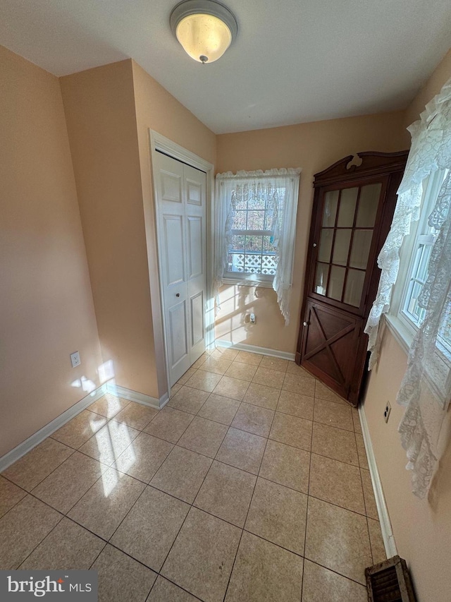 interior space with light tile patterned flooring