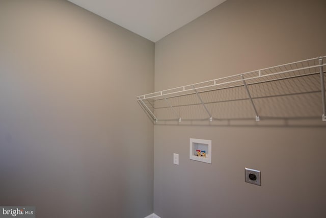 laundry room featuring electric dryer hookup and washer hookup