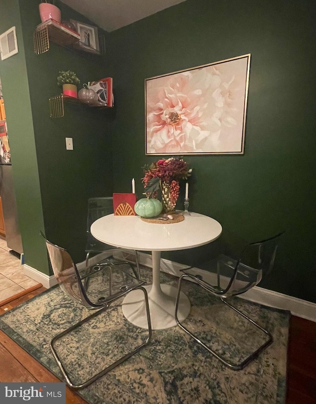 dining area featuring wood-type flooring