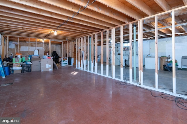 basement with washer / dryer