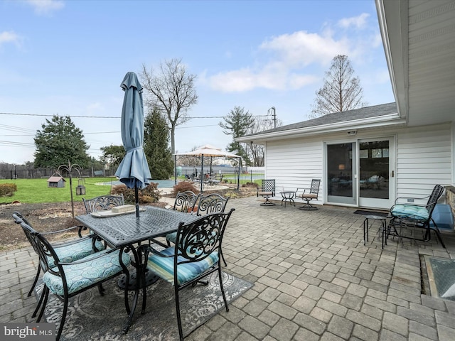 view of patio / terrace featuring a gazebo and outdoor dining space