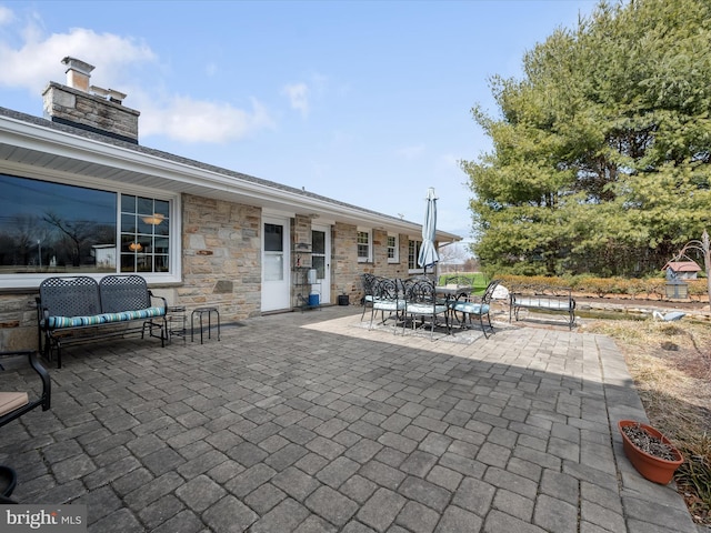 view of patio featuring outdoor dining space