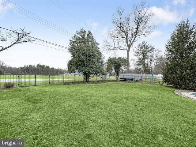 view of yard with fence