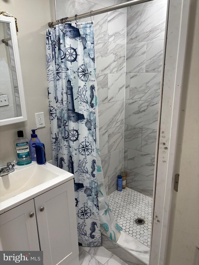 bathroom with vanity and curtained shower