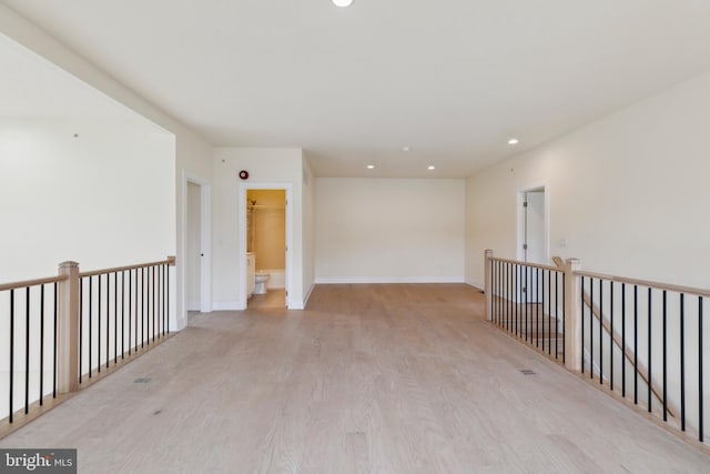 unfurnished room featuring light wood-type flooring