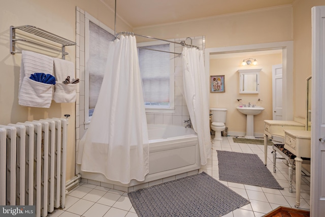 full bathroom featuring radiator, tile patterned flooring, shower / tub combo, and sink