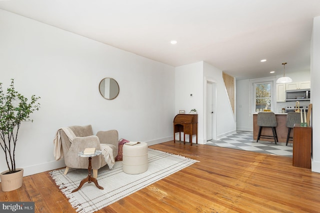 living area featuring light hardwood / wood-style flooring