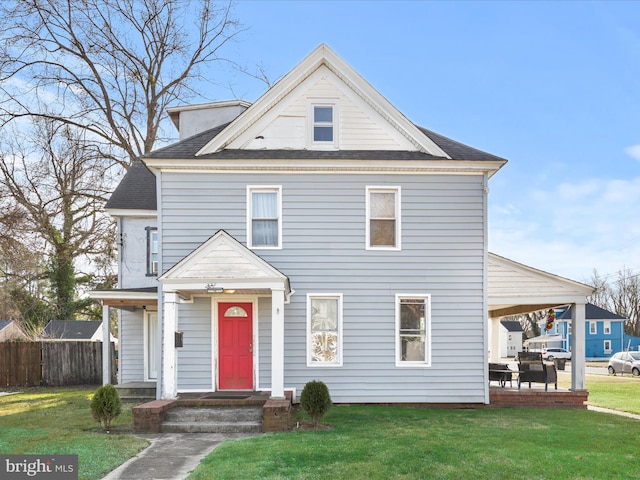 view of front of home featuring a front yard