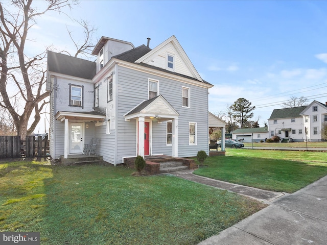 view of front of property featuring a front yard