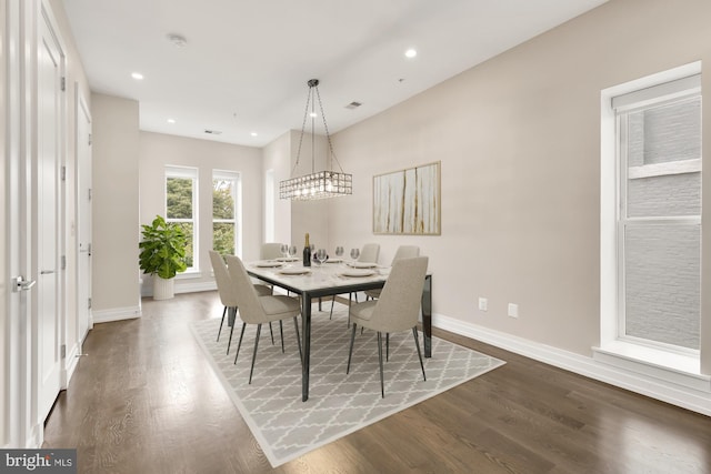 dining area featuring dark hardwood / wood-style floors