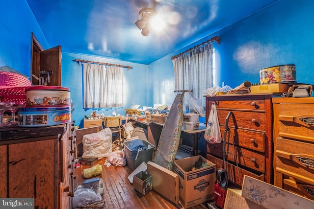 misc room with hardwood / wood-style floors and plenty of natural light