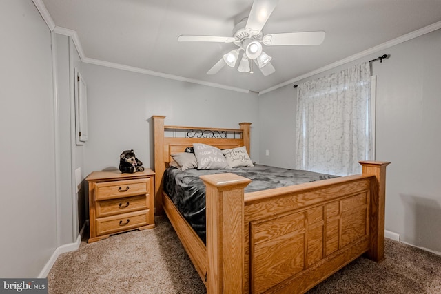 bedroom with ceiling fan, carpet floors, and ornamental molding