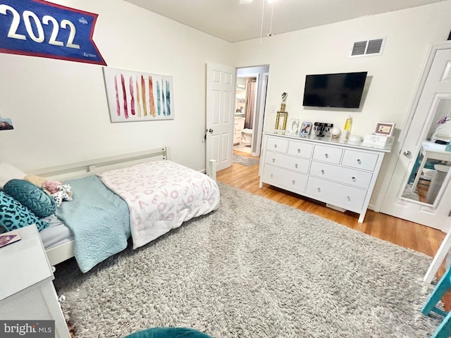 bedroom featuring light hardwood / wood-style flooring