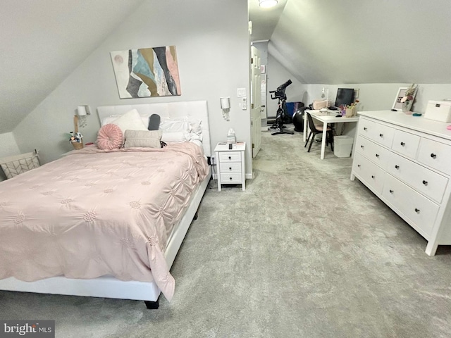 carpeted bedroom featuring vaulted ceiling