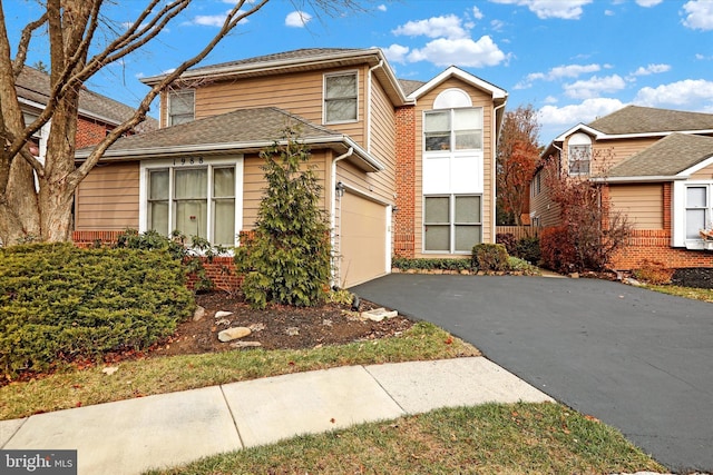 front facade with a garage